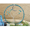 5 inch tree of life yarn wrapped displayed in rock garden blue with blue glass beads